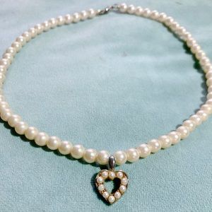 Vintage pearl choker with heart charm.